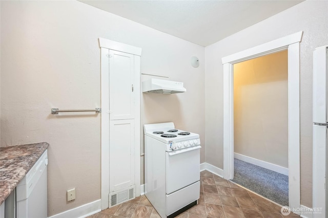 interior space with baseboards and visible vents