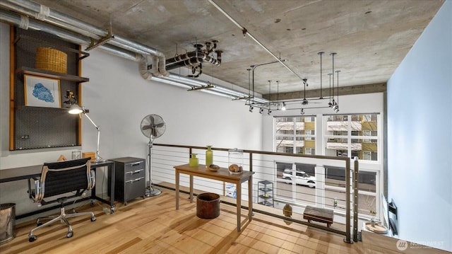 home office featuring wood finished floors