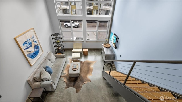 living room with finished concrete flooring