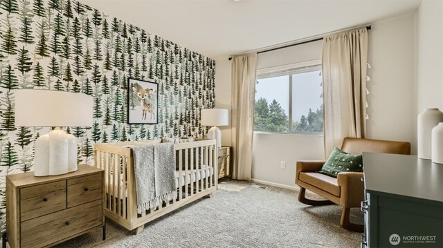 bedroom with carpet and baseboards