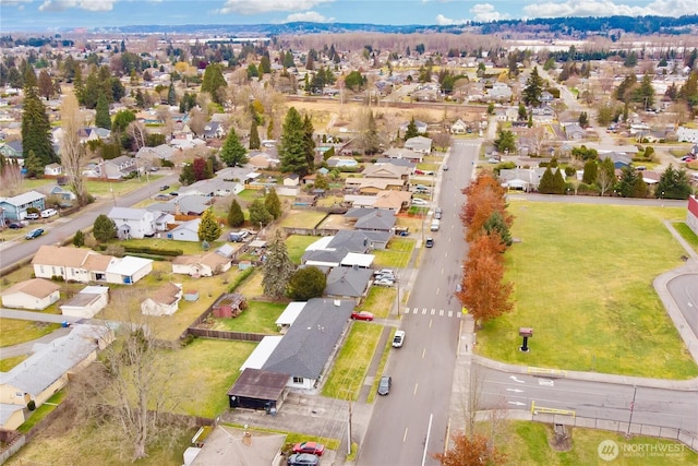 birds eye view of property with a residential view