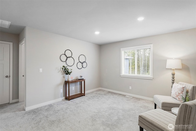 sitting room with light carpet, baseboards, visible vents, and recessed lighting