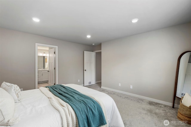 bedroom featuring recessed lighting, baseboards, and light colored carpet