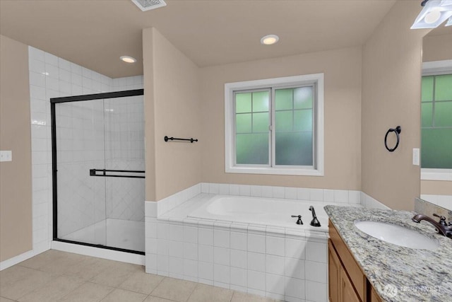 full bath featuring tile patterned flooring, visible vents, vanity, a bath, and a stall shower