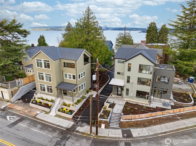 drone / aerial view featuring a water view