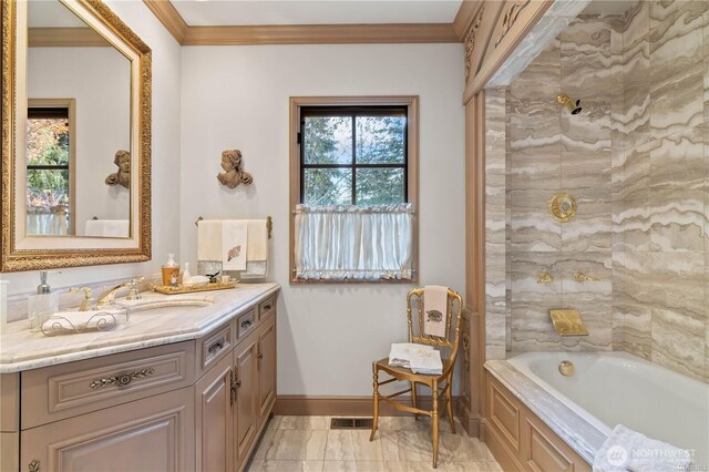 full bathroom featuring plenty of natural light, crown molding, and baseboards