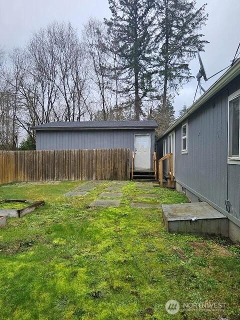 view of yard with fence