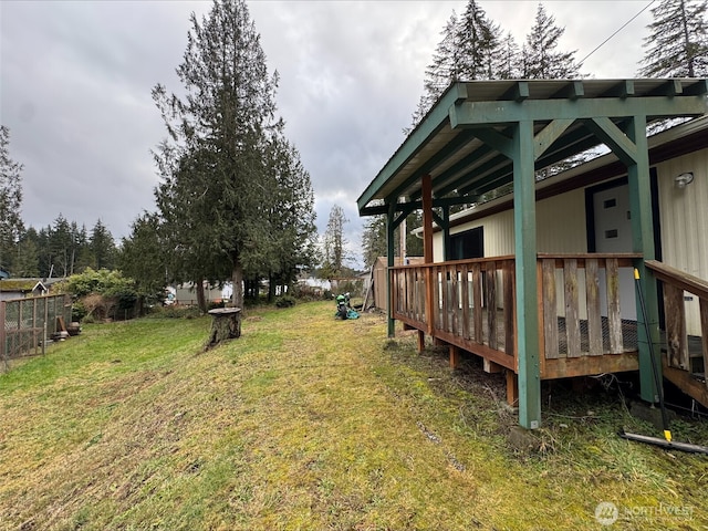 view of yard featuring a deck