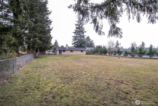 view of yard featuring a fenced backyard