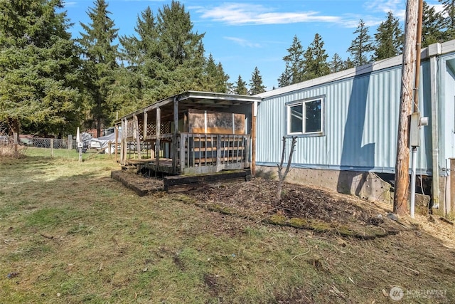 view of property exterior featuring a lawn