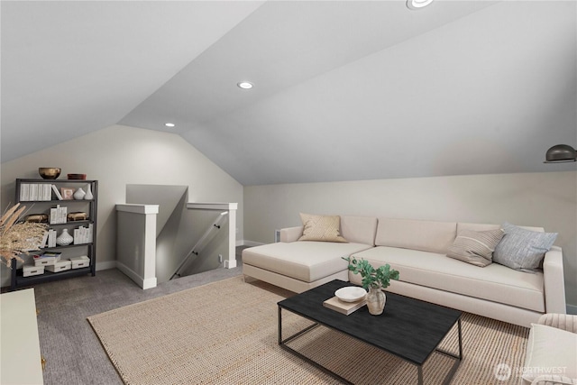 carpeted living area with lofted ceiling, baseboards, and recessed lighting