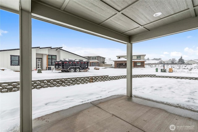 view of snow covered patio