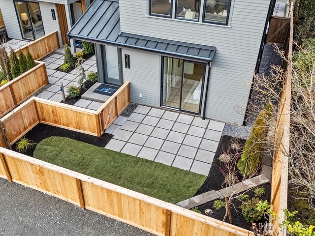 exterior space featuring a fenced backyard