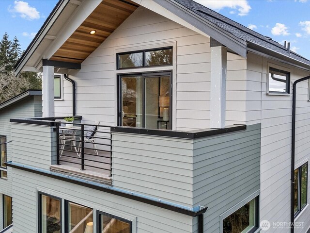 view of property exterior featuring a balcony