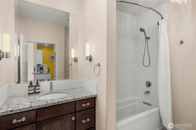 full bath with shower / bath combo with shower curtain and vanity