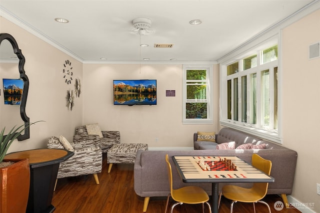 sitting room featuring recessed lighting, dark wood-style flooring, visible vents, baseboards, and crown molding