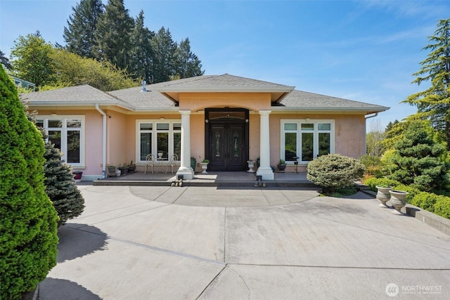 113 Northridge Dr, Ridgefield, WA 98642 - back of house featuring french doors, stucco siding, and a shingled roof