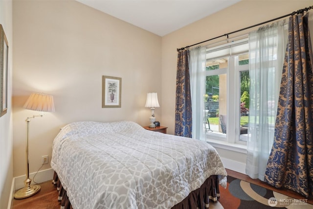 113 Northridge Dr, Ridgefield, WA 98642 - bedroom featuring baseboards, multiple windows, and wood finished floors