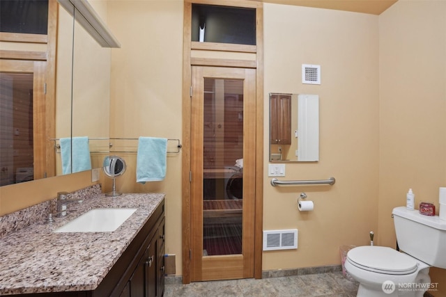 113 Northridge Dr, Ridgefield, WA 98642 - bathroom featuring toilet, baseboards, visible vents, and vanity