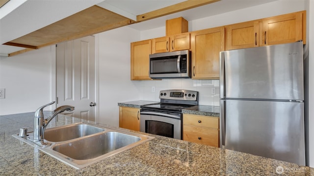 300 110th Ave NE Unit 605, Bellevue, WA 98004 - kitchen featuring appliances with stainless steel finishes, tile countertops, a sink, and backsplash
