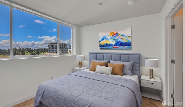300 110th Ave NE Unit 605, Bellevue, WA 98004 - bedroom featuring baseboards