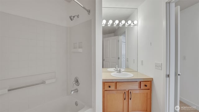 300 110th Ave NE Unit 605, Bellevue, WA 98004 - bathroom with washtub / shower combination and vanity