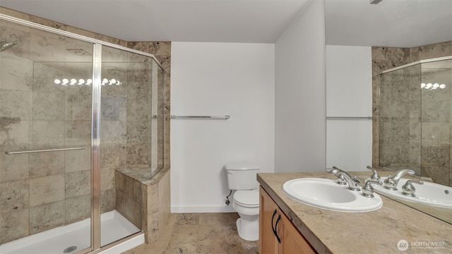300 110th Ave NE Unit 605, Bellevue, WA 98004 - full bath featuring a stall shower, baseboards, and toilet