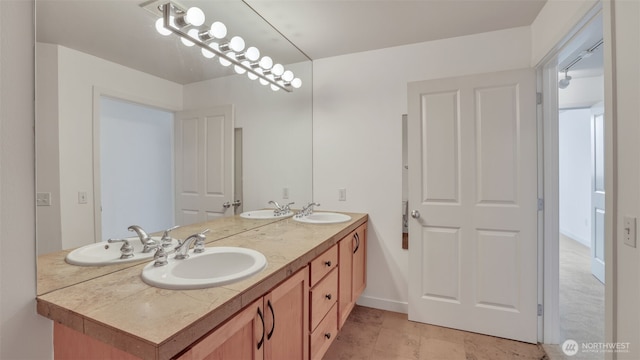 300 110th Ave NE Unit 605, Bellevue, WA 98004 - full bath featuring double vanity and baseboards
