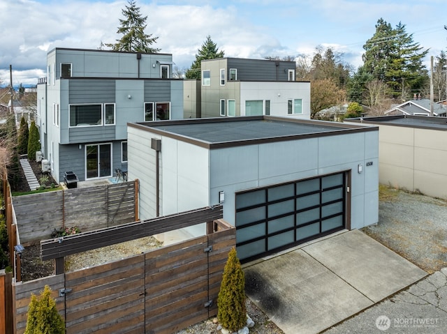 exterior space with a garage and driveway