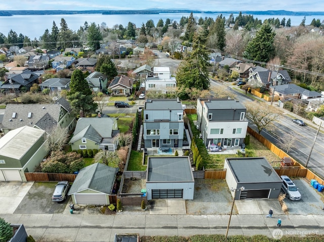 aerial view featuring a residential view and a water view