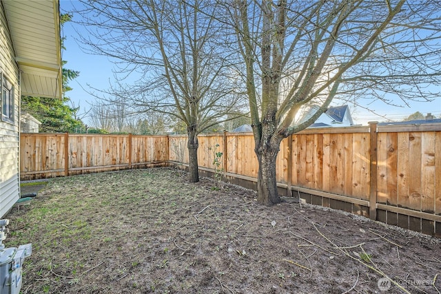 view of yard featuring a fenced backyard