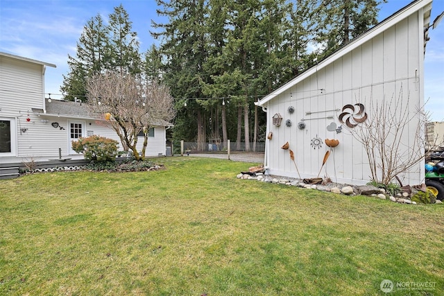 view of yard featuring fence