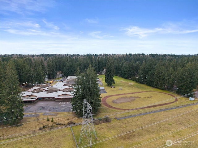 aerial view featuring a view of trees