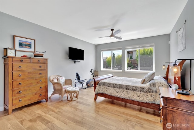 bedroom featuring light wood-style flooring and ceiling fan