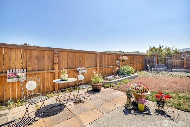 view of patio with a fenced backyard