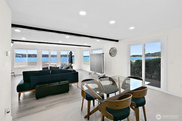 dining space featuring a wealth of natural light, beamed ceiling, and recessed lighting