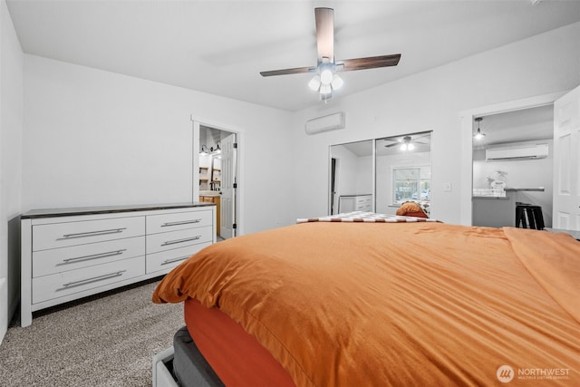 carpeted bedroom featuring a wall mounted AC and a ceiling fan