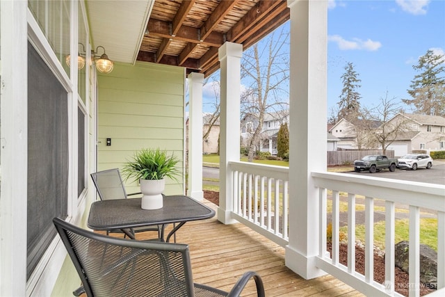 balcony with a residential view and covered porch