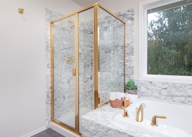 full bath featuring a marble finish shower, a bath, and tile patterned floors