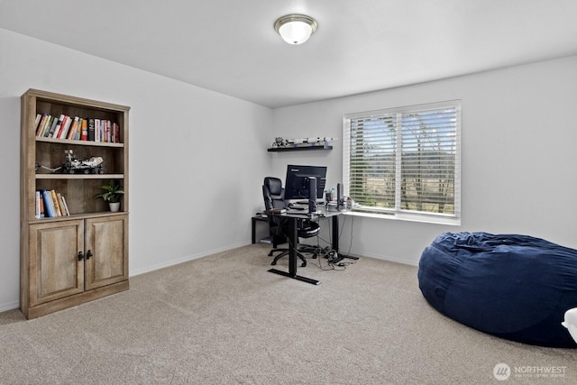 office with light colored carpet and baseboards