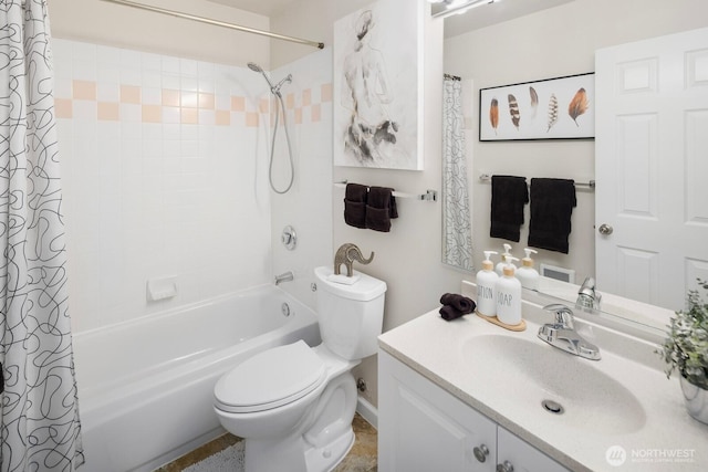 bathroom featuring shower / tub combo, vanity, and toilet