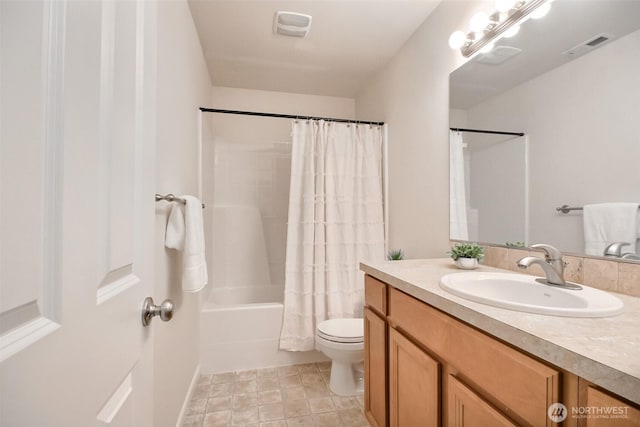 bathroom featuring toilet, visible vents, shower / bath combination with curtain, and vanity