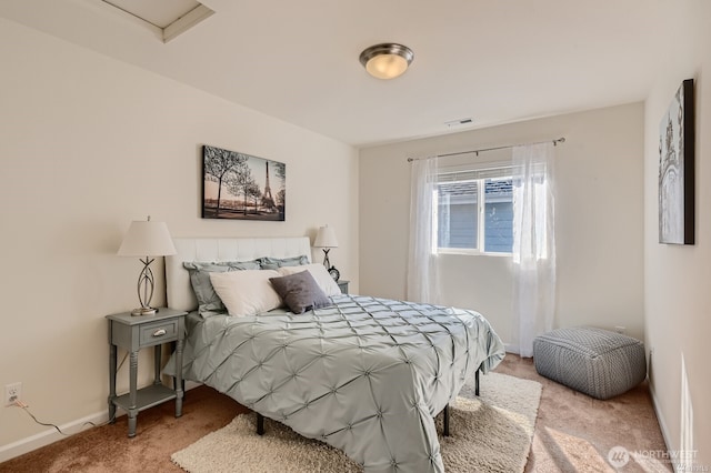 bedroom featuring light carpet, baseboards, and visible vents