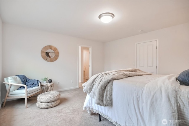 bedroom with carpet flooring and baseboards