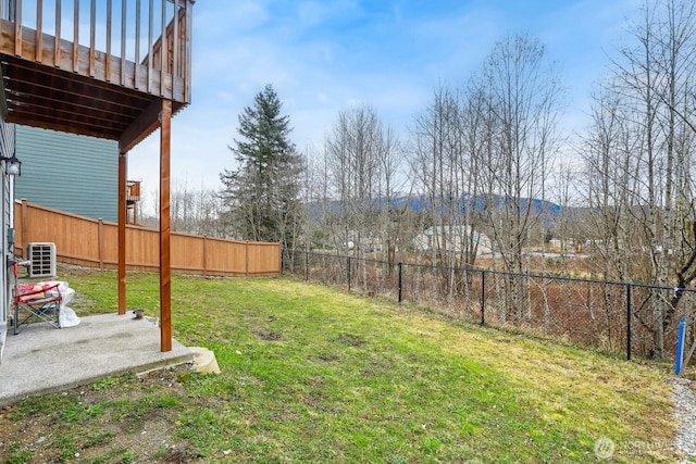 view of yard featuring a patio area and a fenced backyard