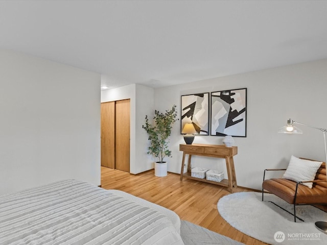 bedroom with wood finished floors