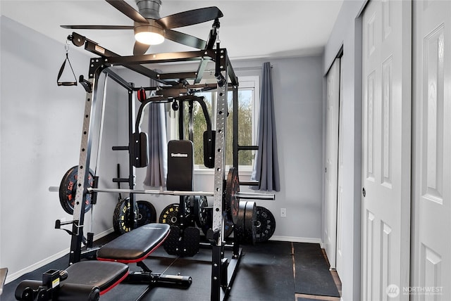 exercise room with baseboards