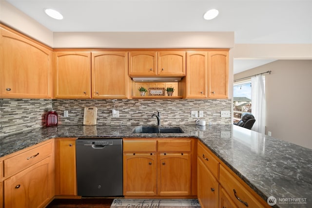 kitchen with tasteful backsplash, dark stone counters, dishwasher, open shelves, and a sink