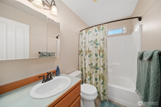 bathroom featuring toilet, shower / bathtub combination with curtain, and vanity