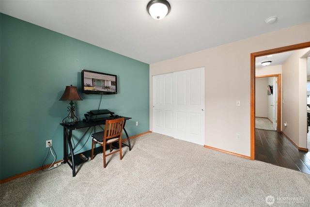 office with carpet flooring and baseboards